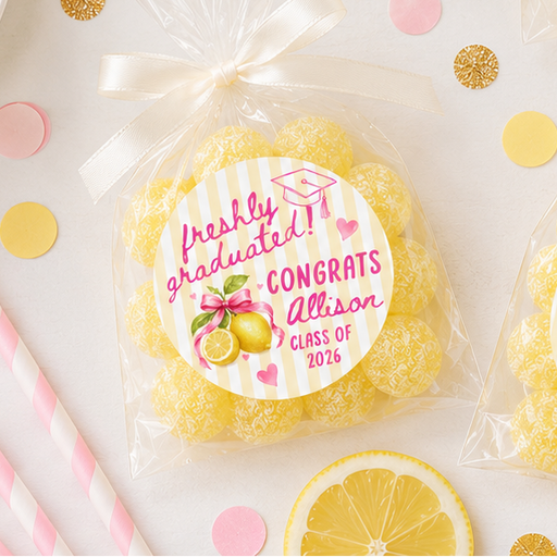 Packaged lemon candies with personalized labels on a celebratory background.